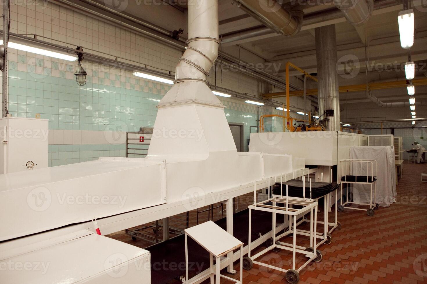 cookie making machine in the factory photo