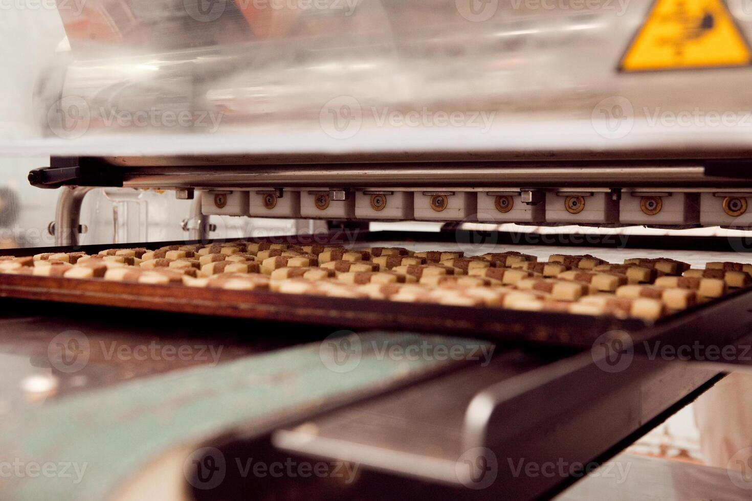 cookie making machine in the factory photo