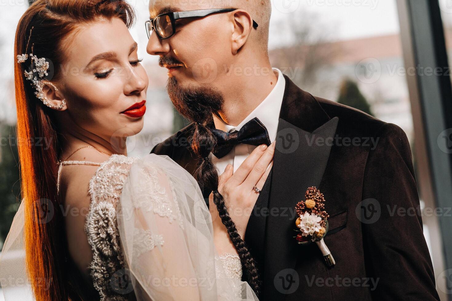 Stylish wedding couple in the interior. Glamorous bride and groom photo