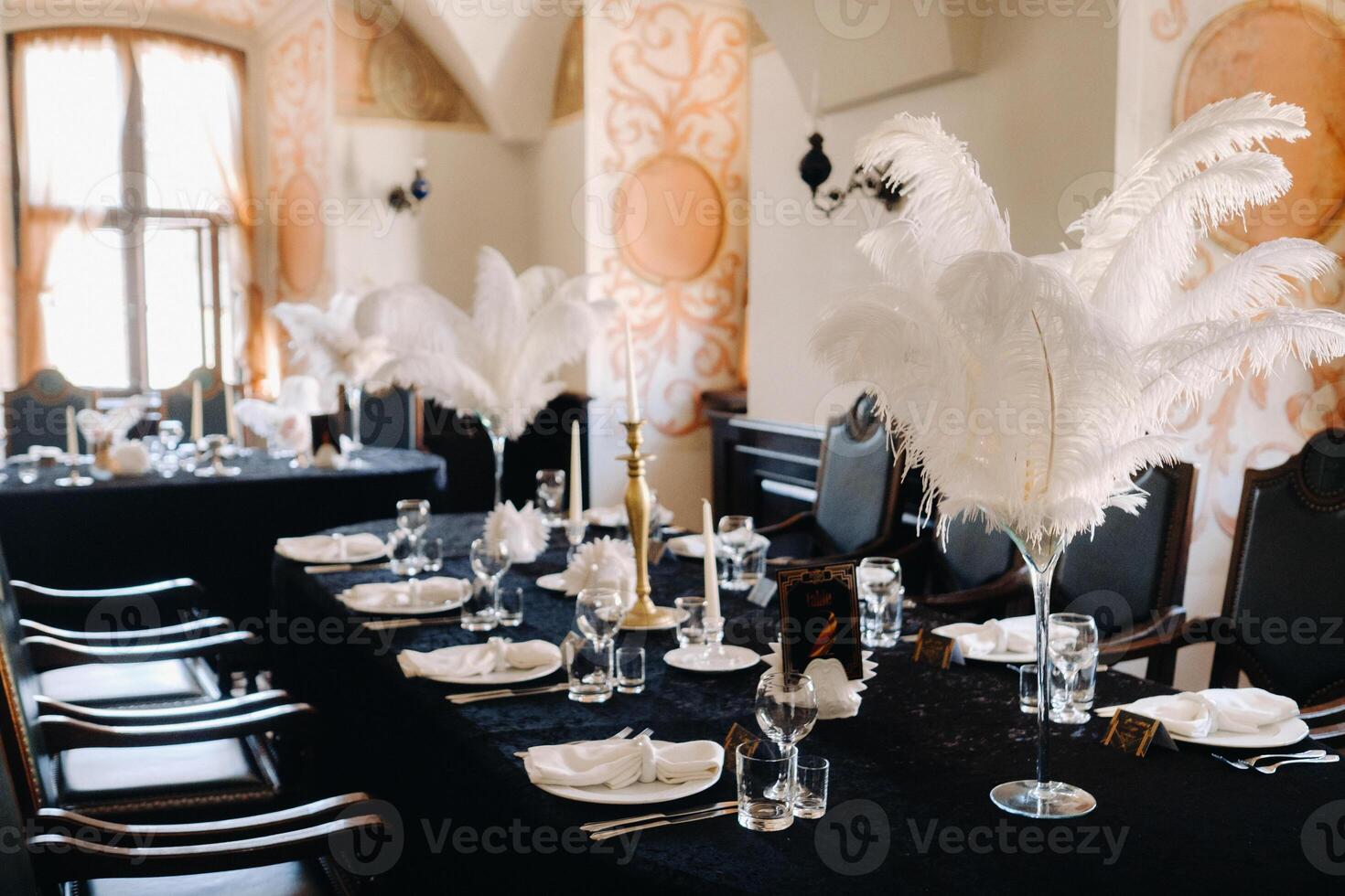 decorated festive table for a wedding evening in an old castle photo