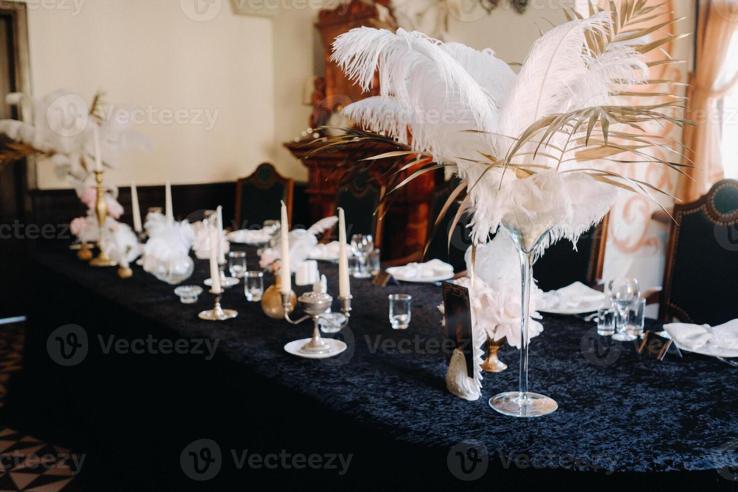 decorated festive table for a wedding evening in an old castle photo