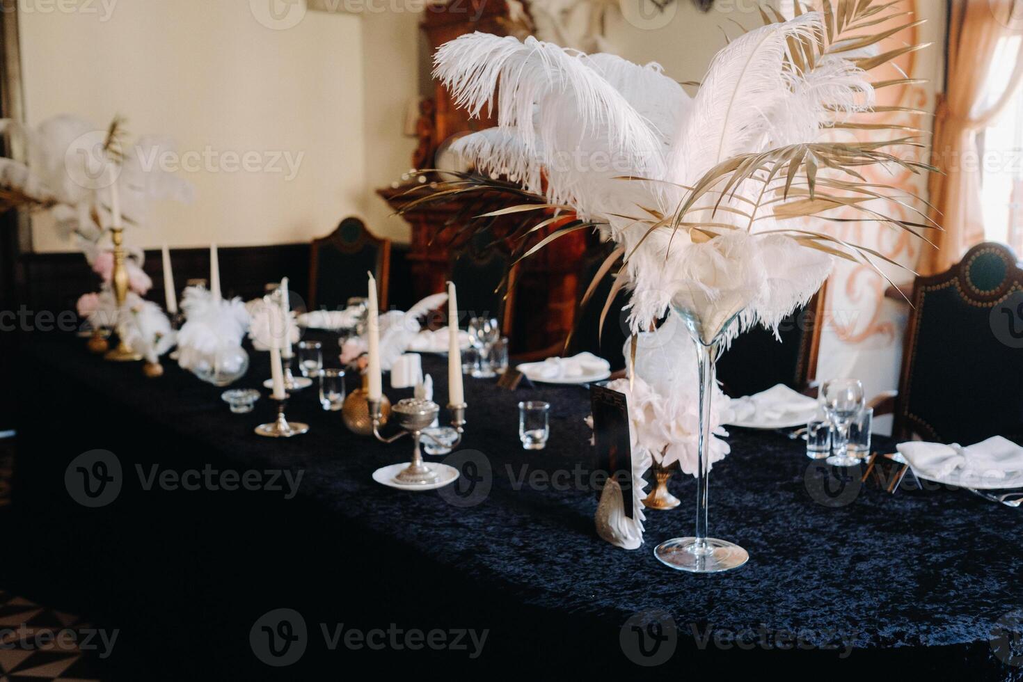 decorated festive table for a wedding evening in an old castle photo