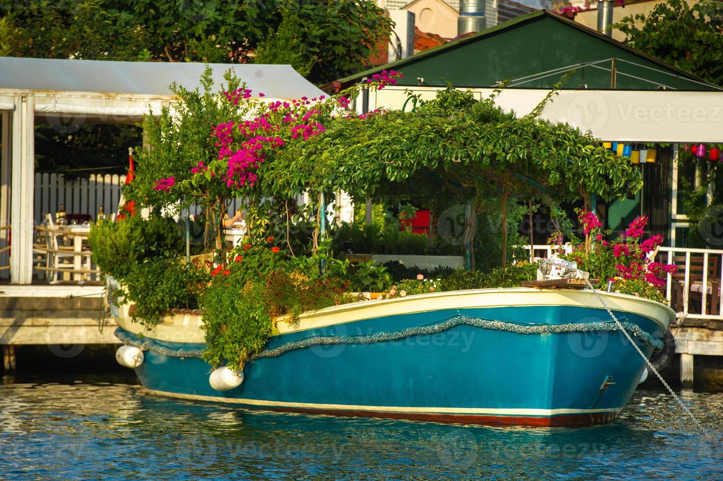 View of the embankment with boats and the canal in Dalyan.Turkey photo