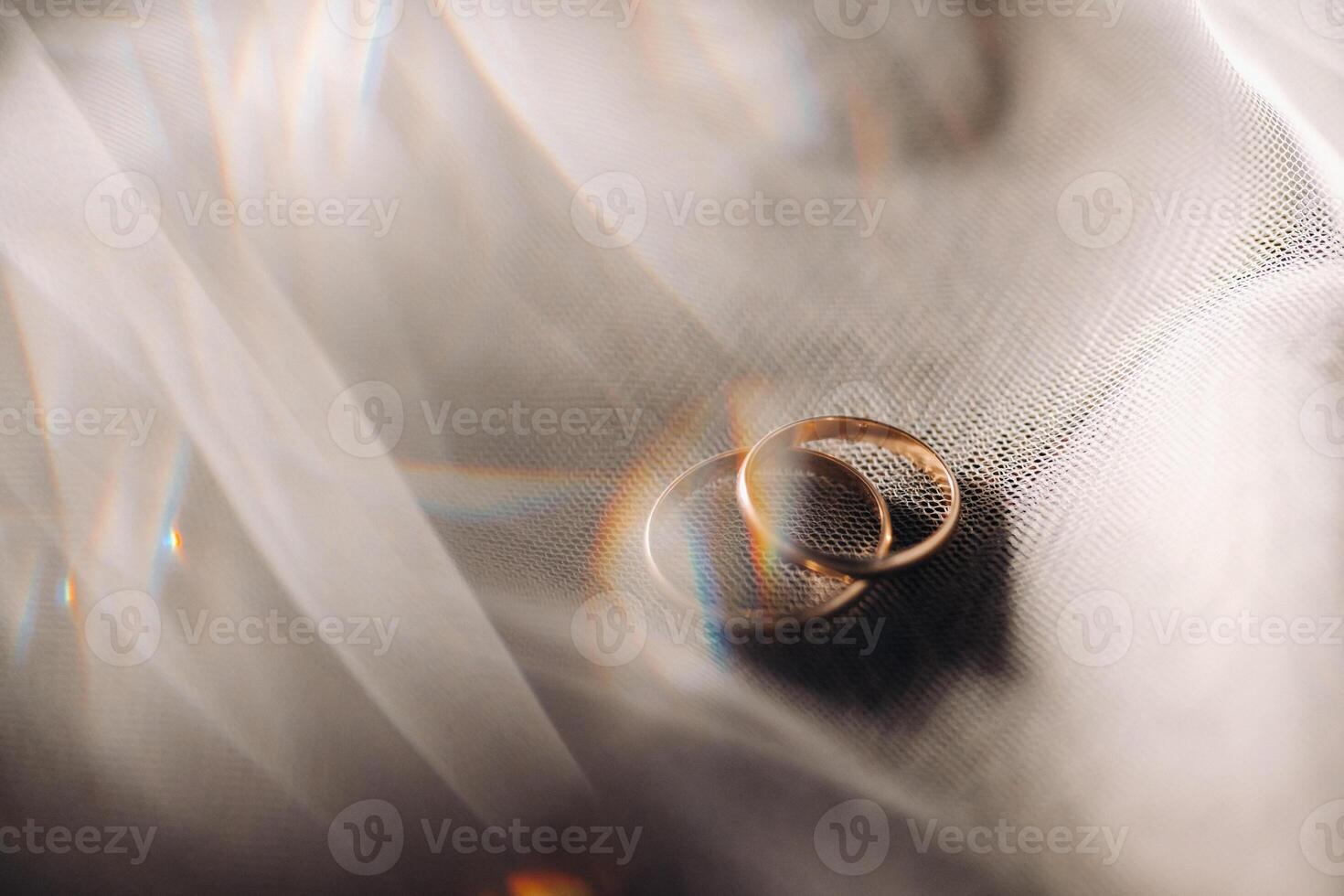 Close-up of two gold wedding rings for a wedding photo