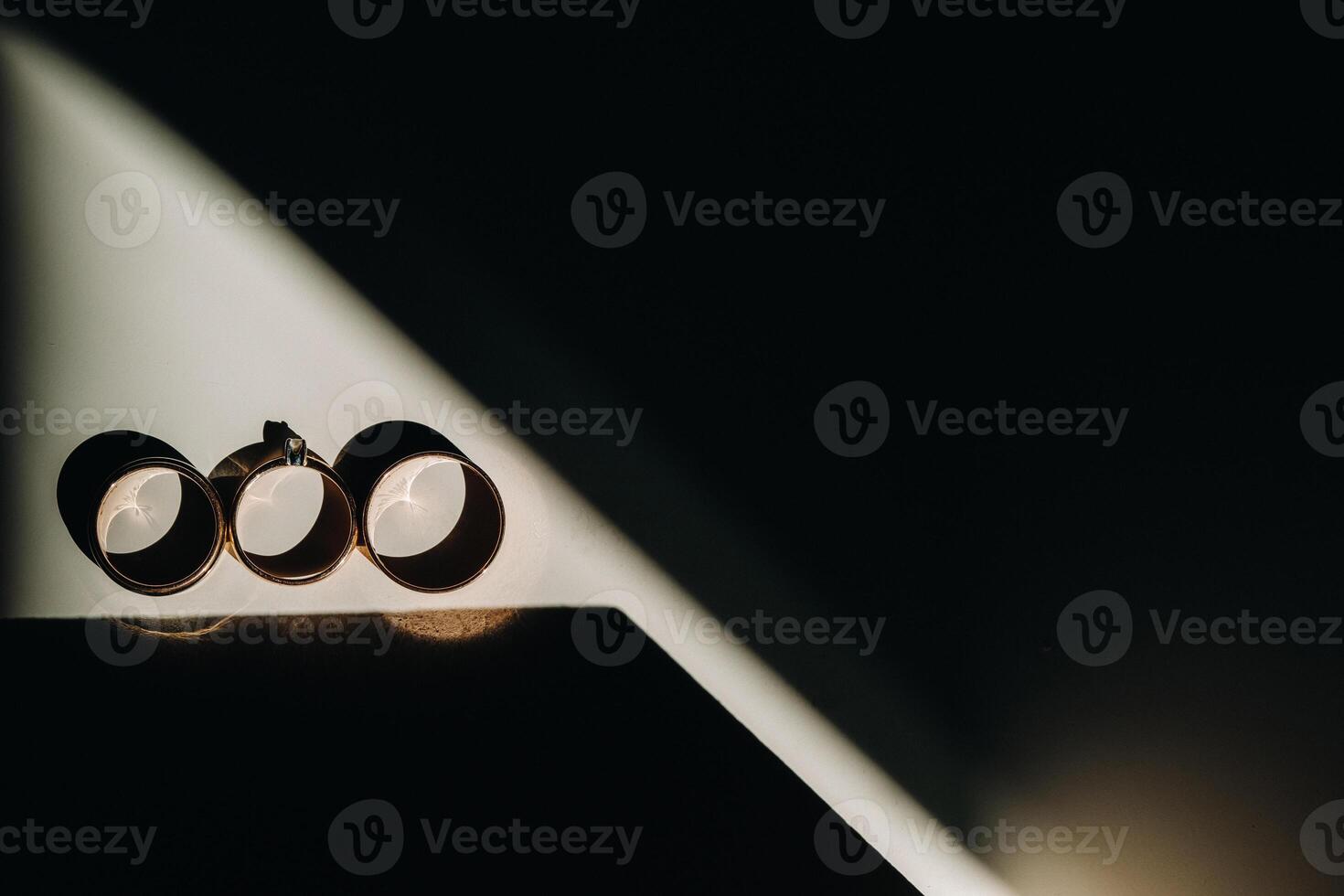 Close-up of two gold wedding rings for a wedding photo