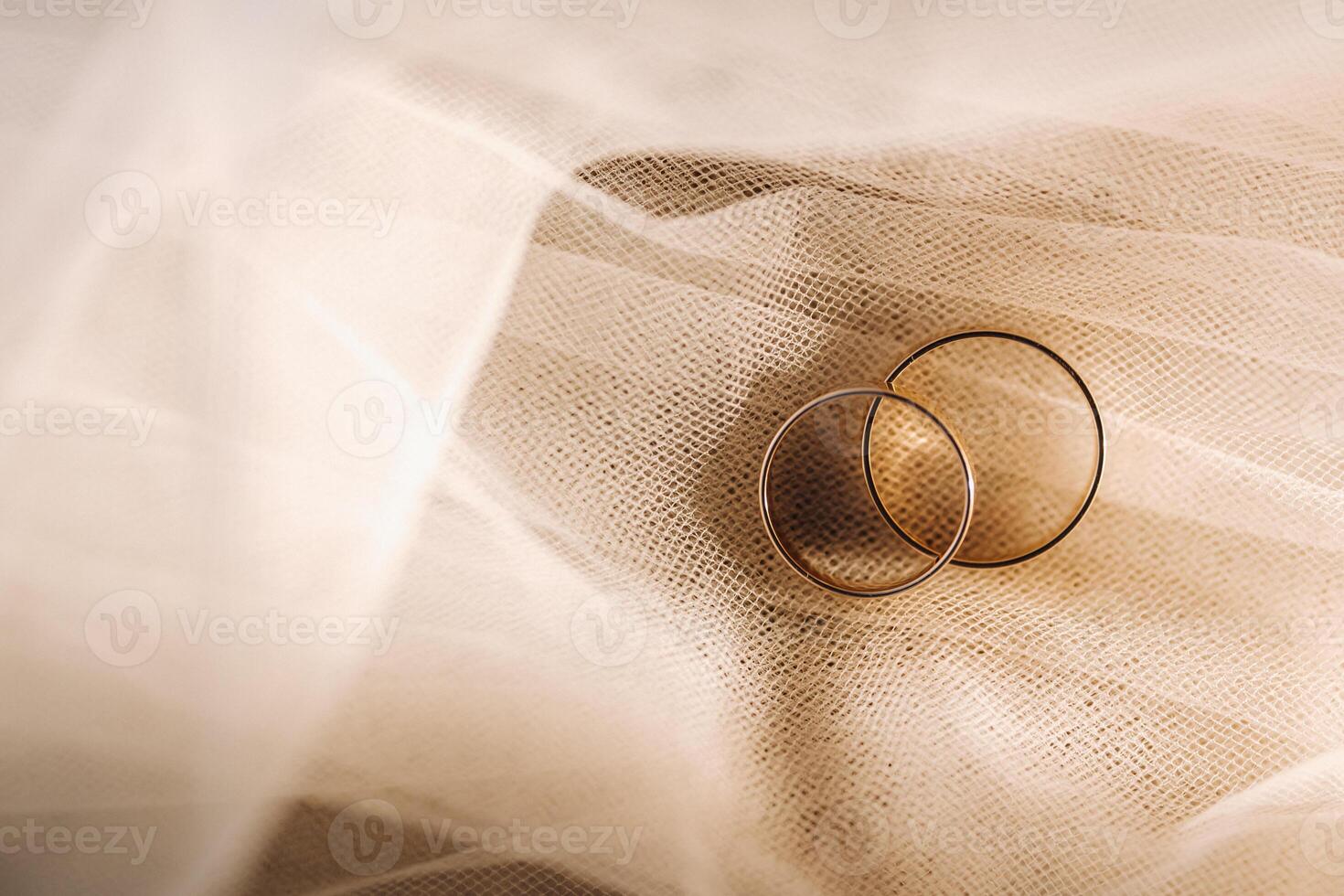 Close-up of two gold wedding rings for a wedding photo
