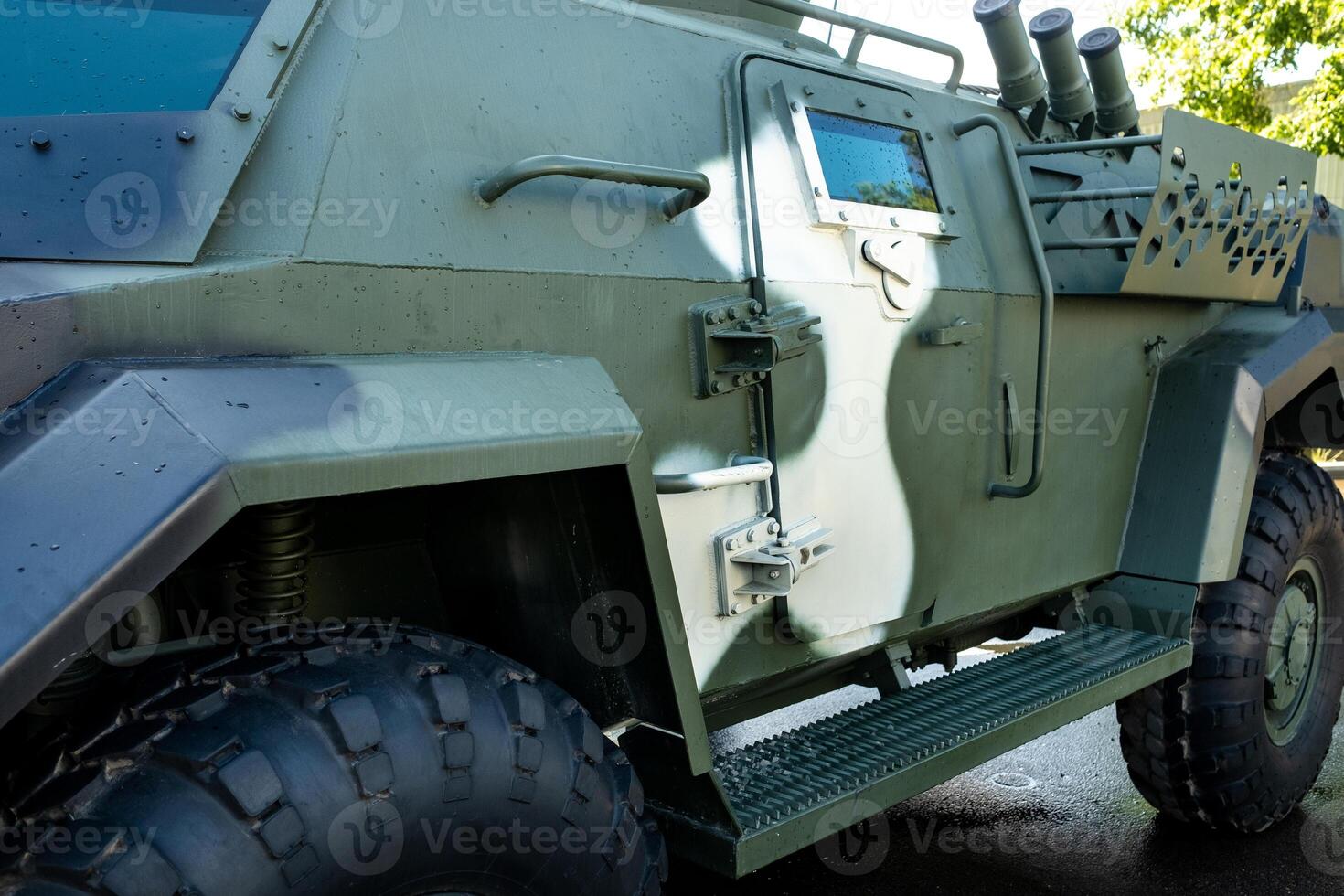 Military armored SUV of green color.Military concept photo