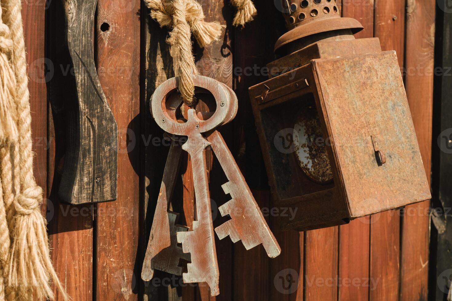 A bunch of old wooden keys hanging on a rope, close-up photo