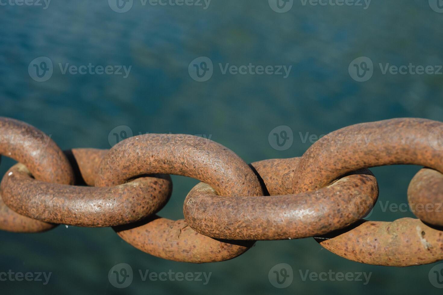 Old rusty metal chain outdoors. Large chain links photo