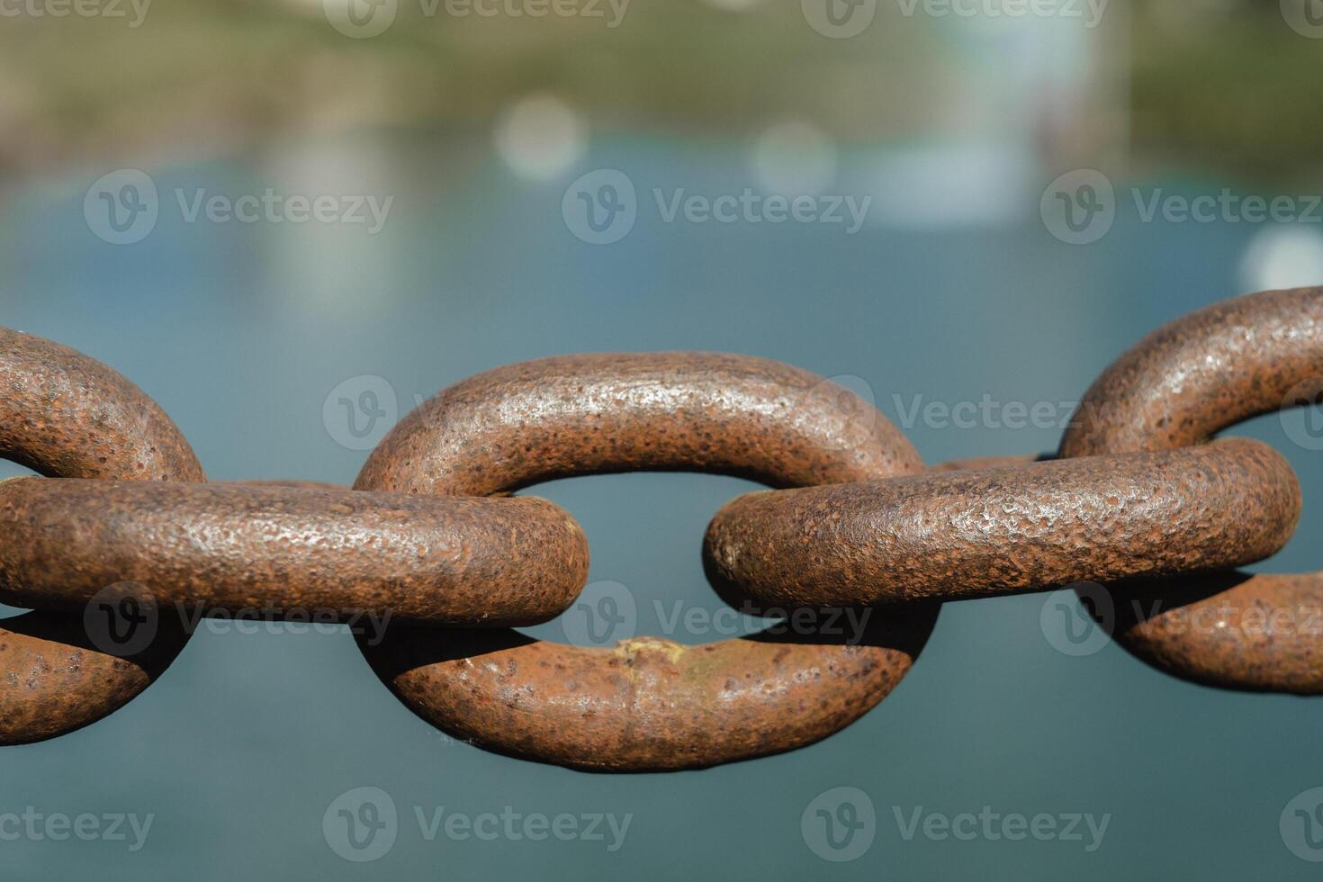 Old rusty metal chain outdoors. Large chain links photo