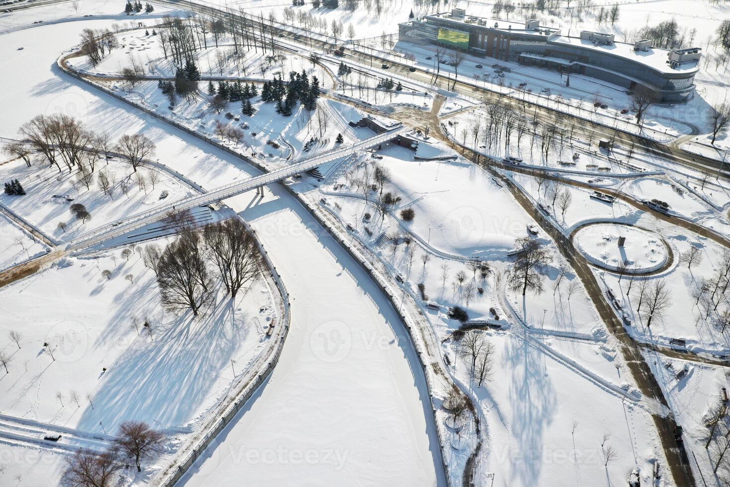 Top view of the pedestrian bridge over the frozen Svisloch river in Minsk. Belarus photo