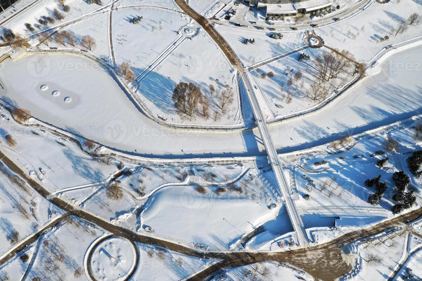 Top view of the pedestrian bridge over the frozen Svisloch river in Minsk. Belarus photo