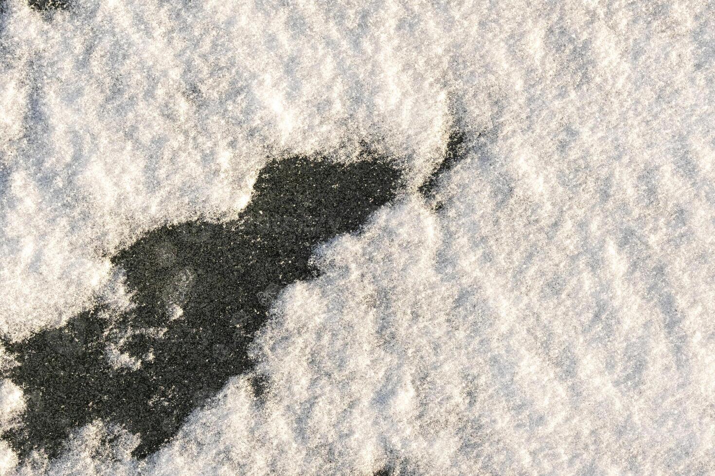 snow background. Snow lying on the ice. Snow texture photo