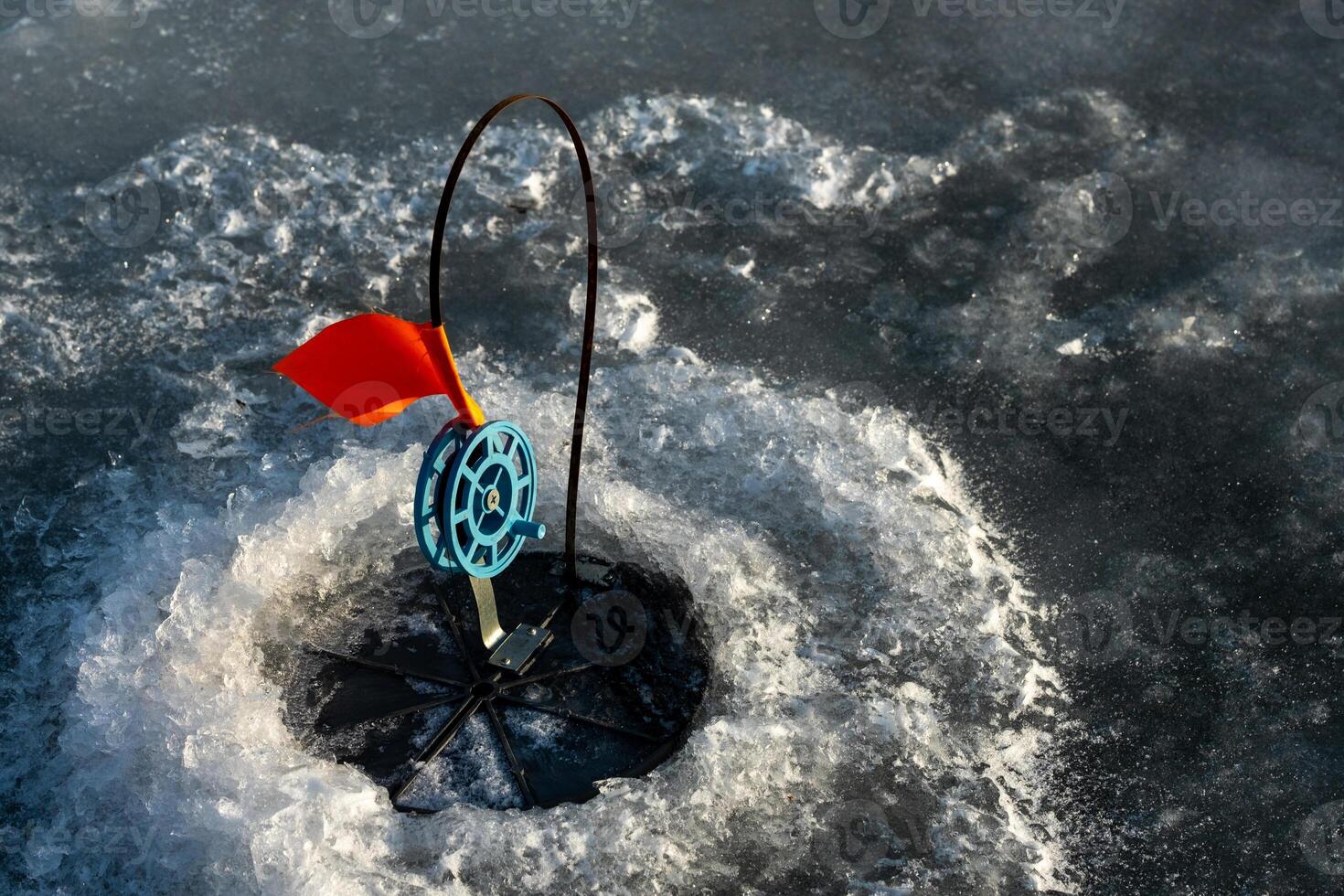 tackle for winter fishing, Fishing in the winter in the hole on live bait. photo