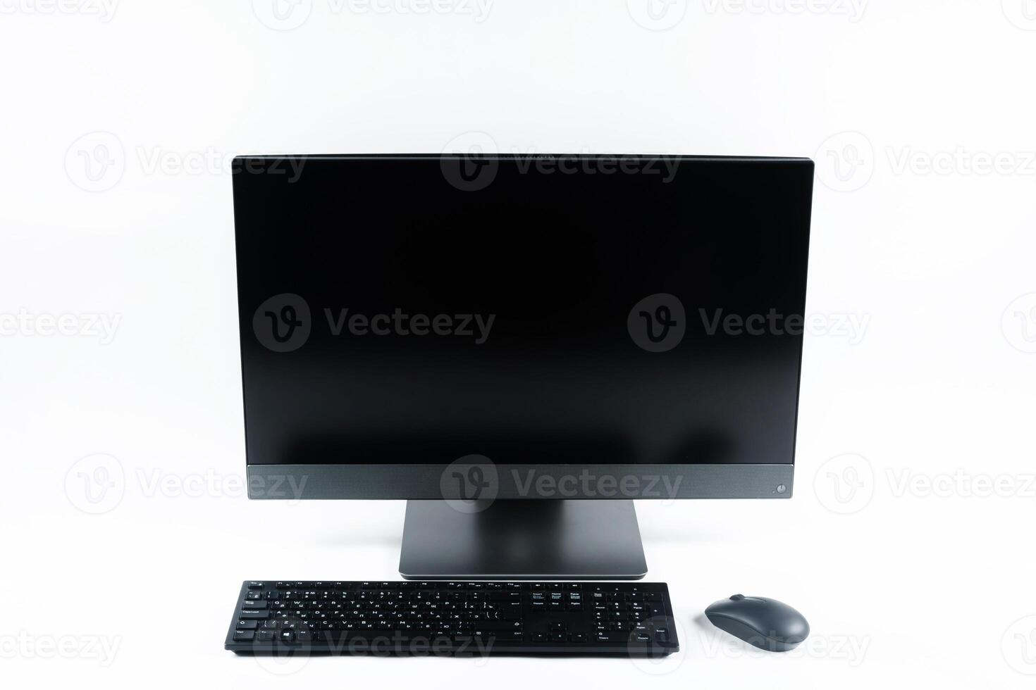 monoblock with keyboard and mouse on a white background.The computer is on white isolate photo