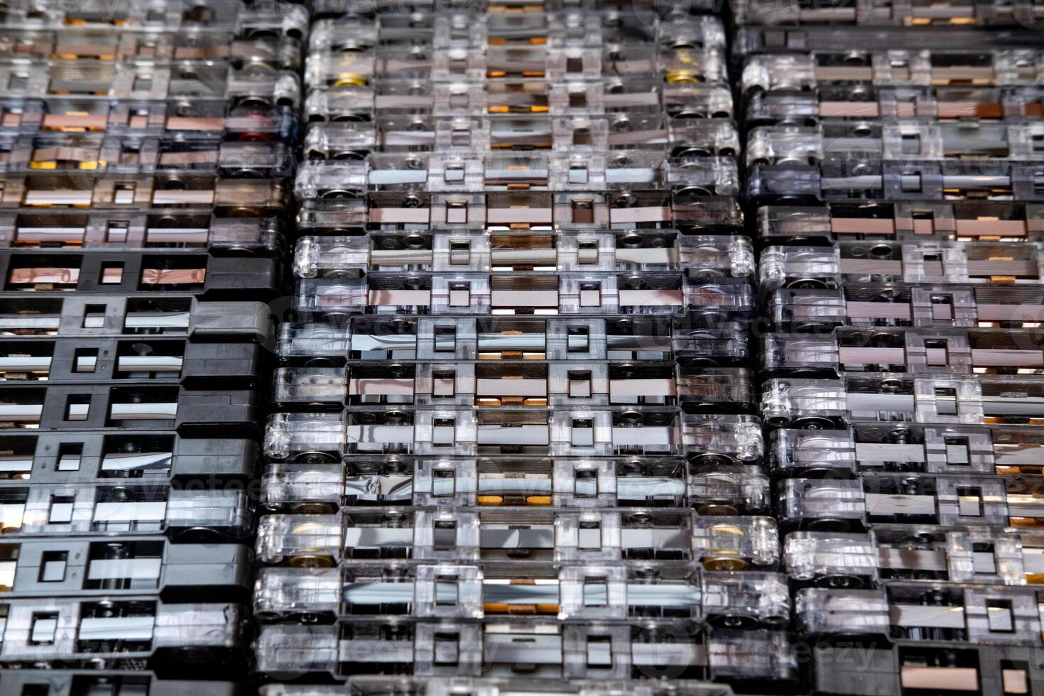 Huge collection of audio cassettes. Retro musical background photo