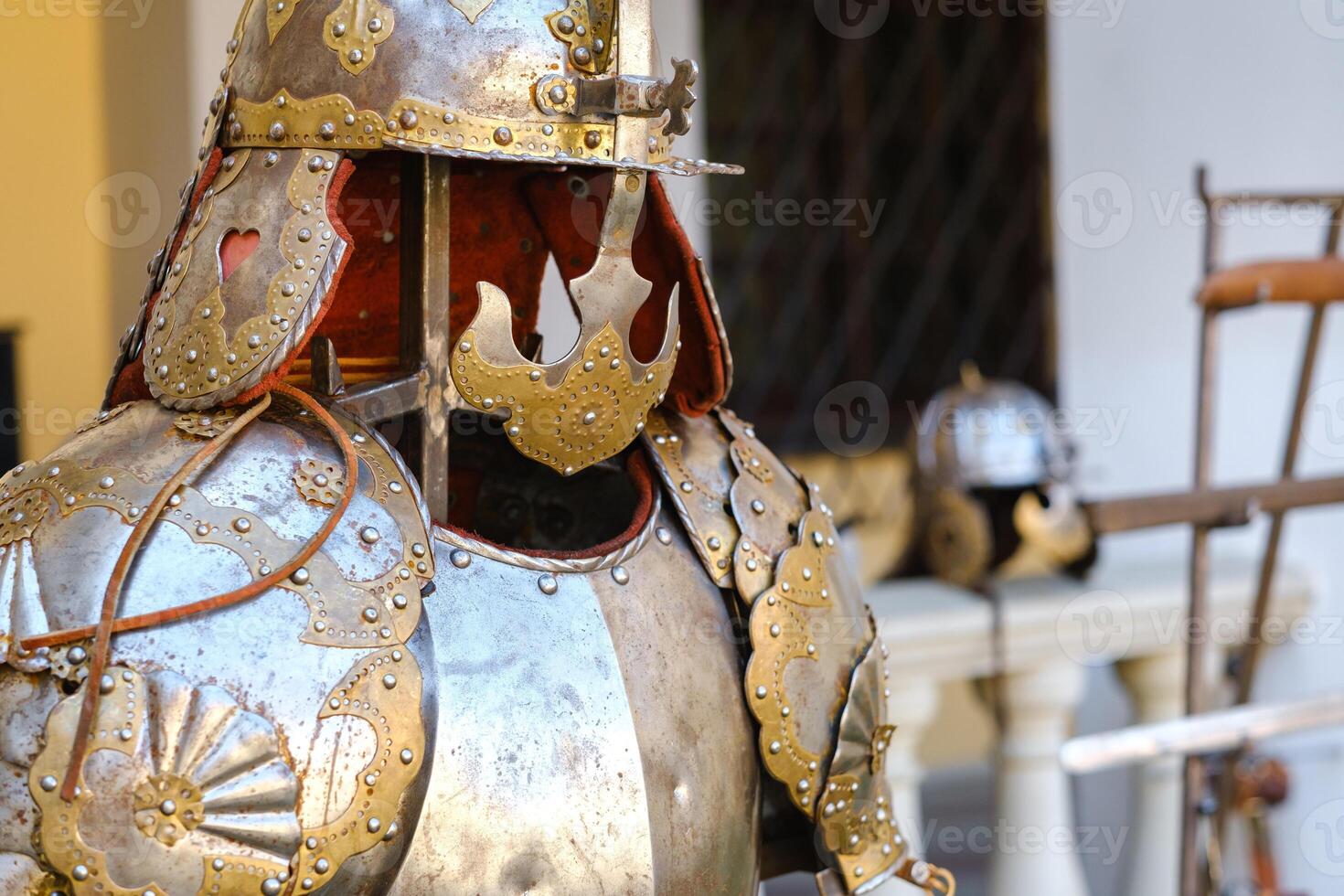 An ancient Knight's helmet with armor.A medieval concept photo