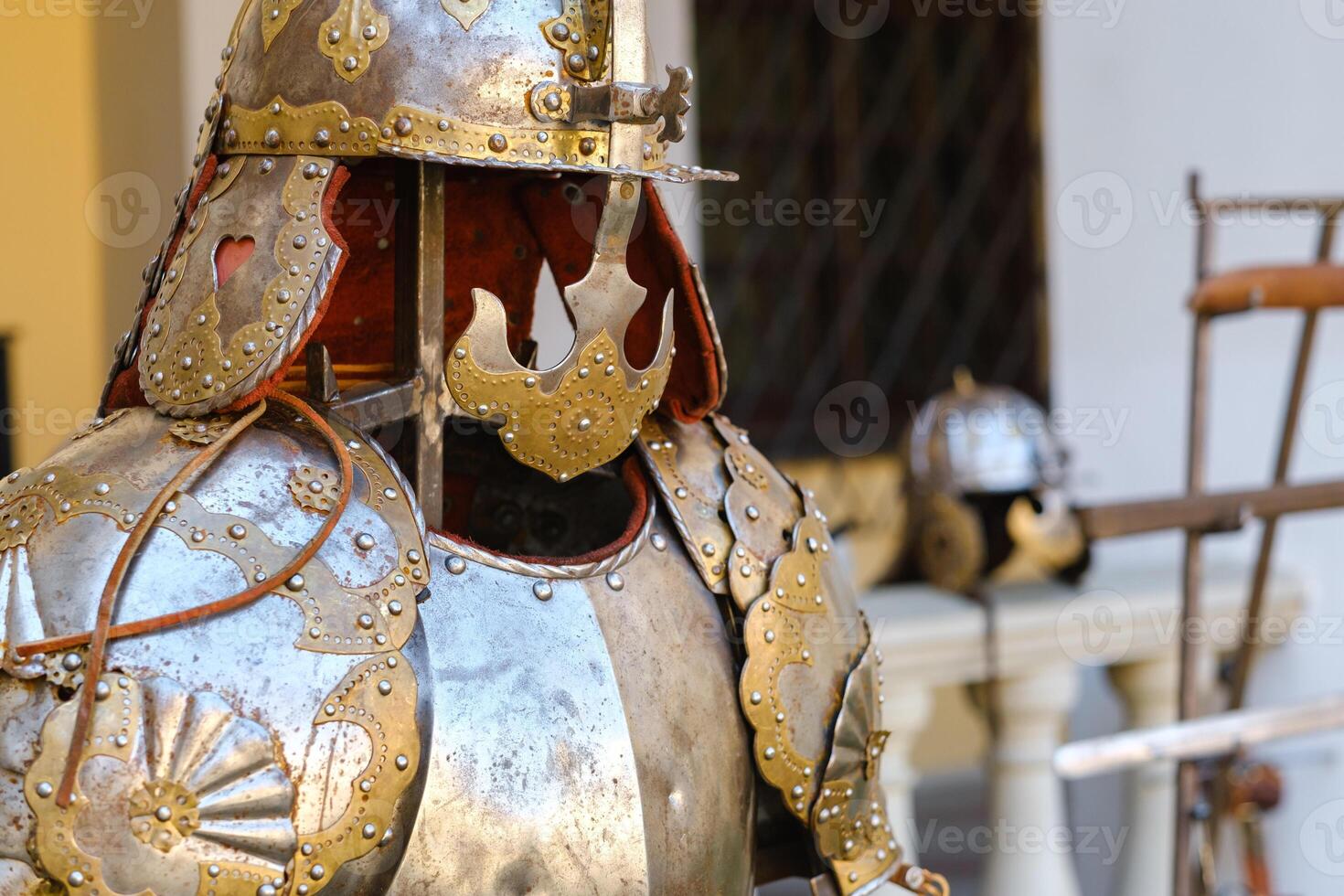 An ancient Knight's helmet with armor.A medieval concept photo