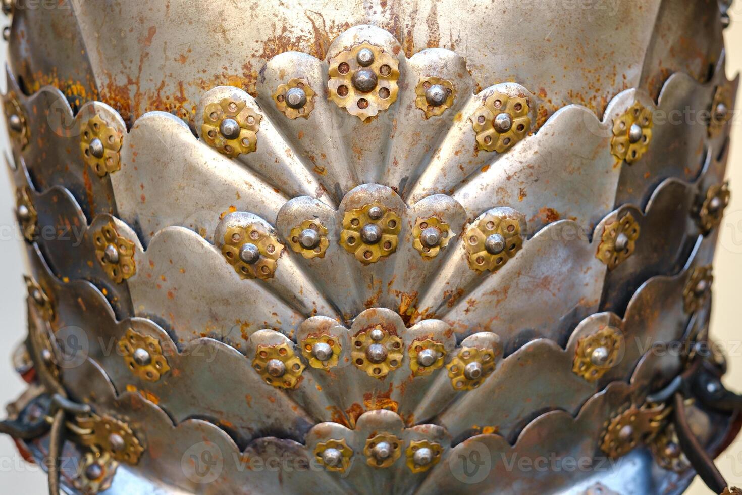 Parts of ancient knight's armor.A medieval concept.Metallic texture photo
