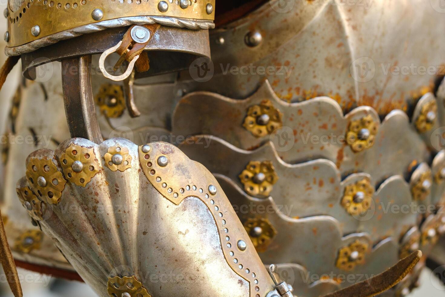 Parts of ancient knight's armor.A medieval concept.Metallic texture photo