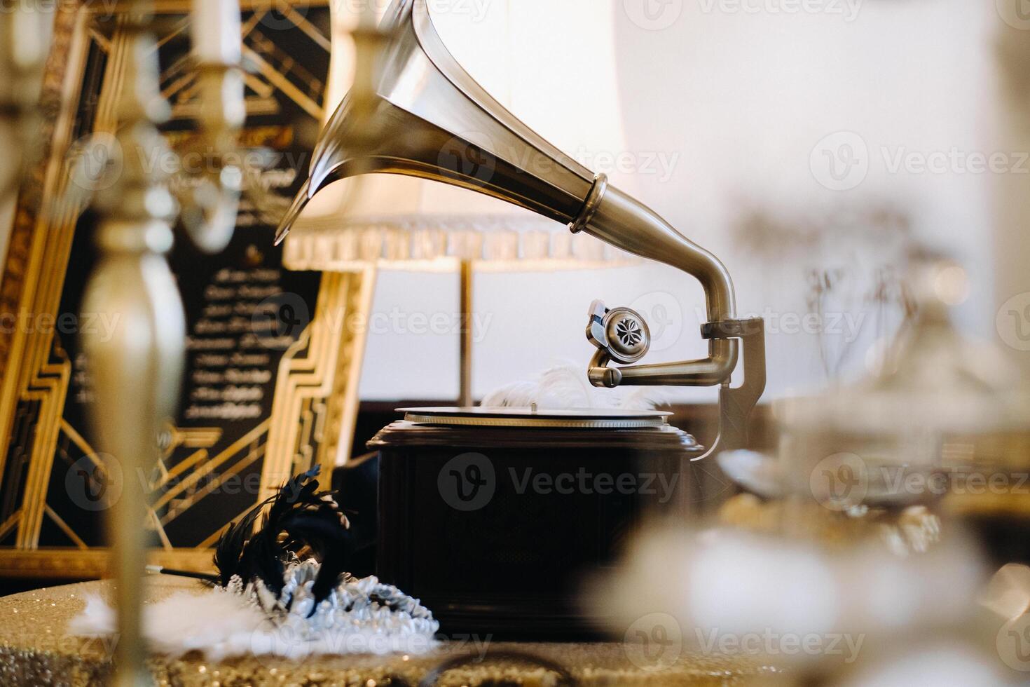 An old retro gramophone is playing a record photo