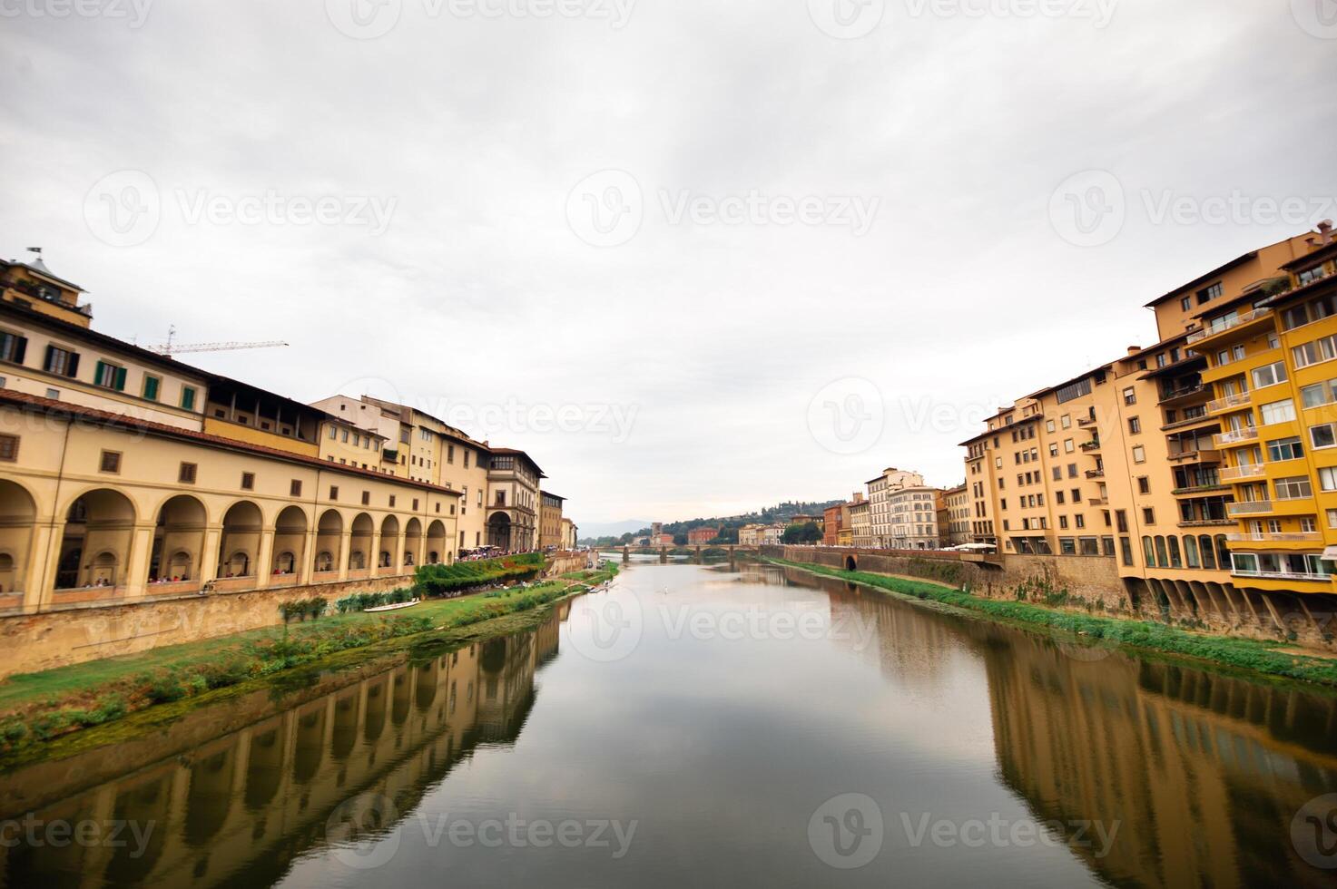The Uffizi Gallery and the Arno River taken from the Ponte Vecchio bridge on the Arno River in Florence Italy photo