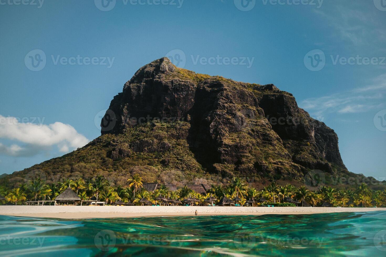 Beautiful beach, palm trees, and clouds on the horizon. Africa, Mauritius, South, near Le Morne photo