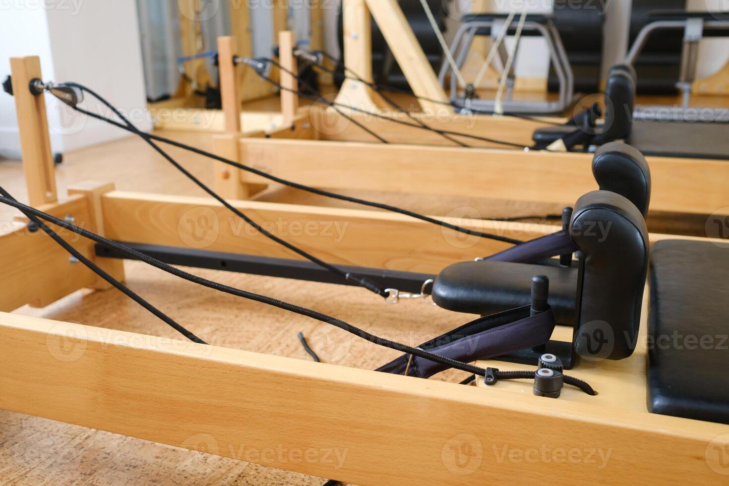 the reformer machine in the pilates room. Yoga equipment photo