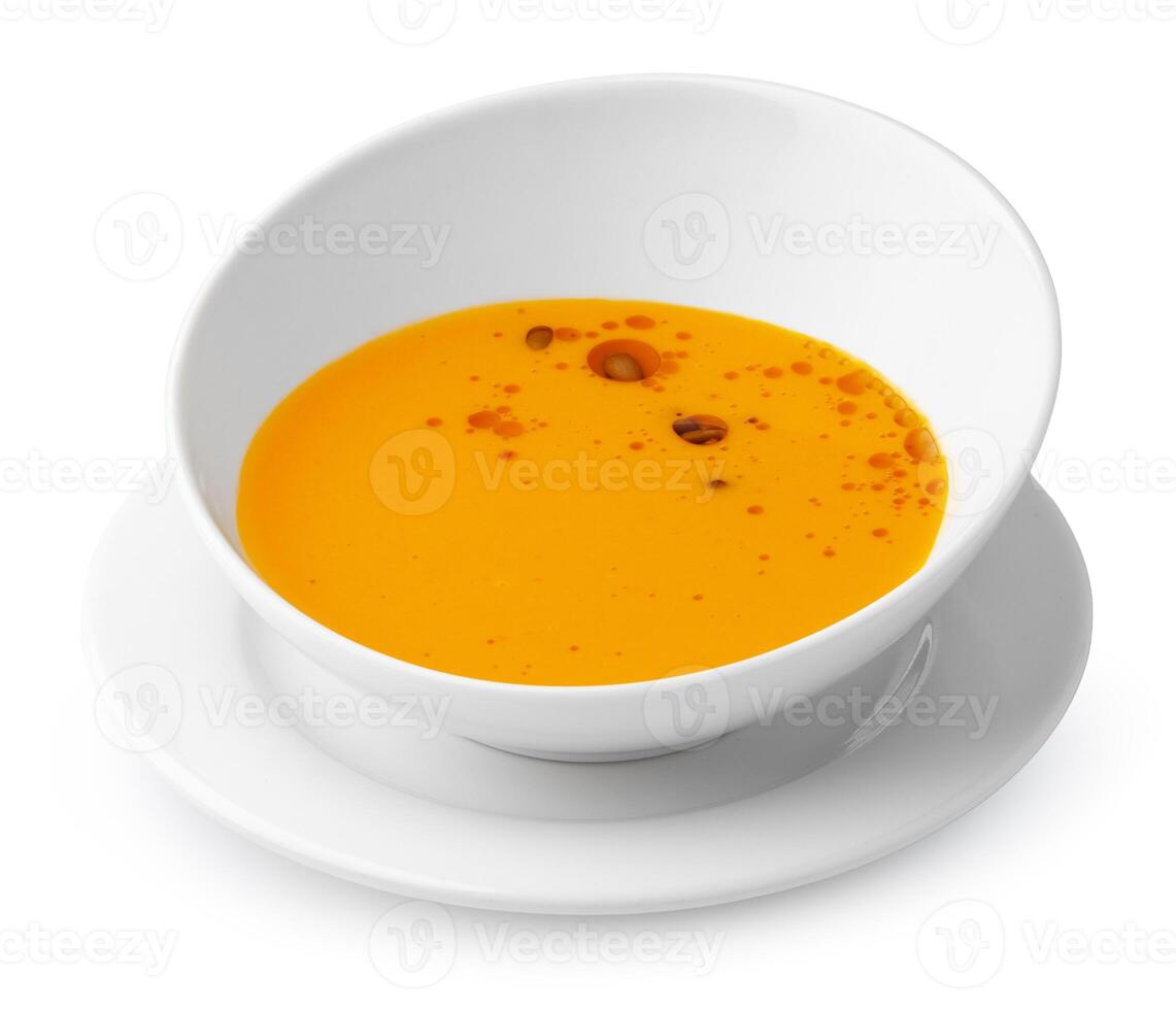 Chicken soup in bowl on white background photo