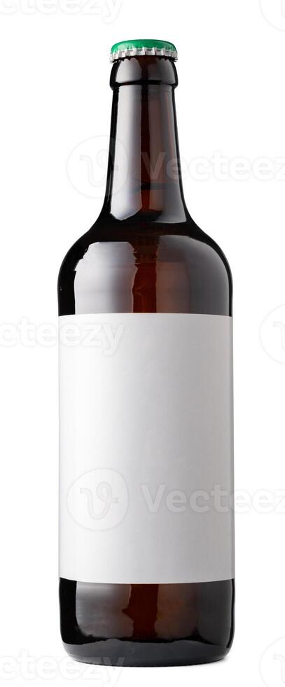 Small glass bottle with beer on a white background photo