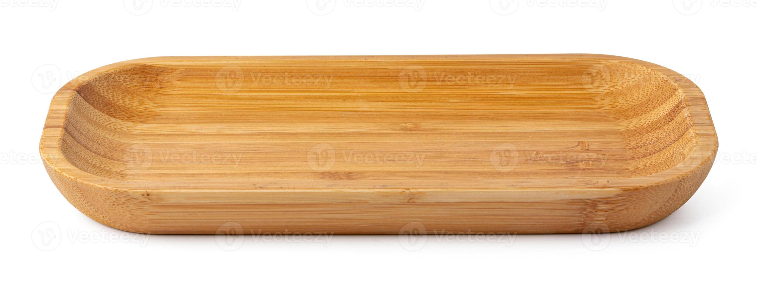 Wooden plate isolated on white background, close up photo
