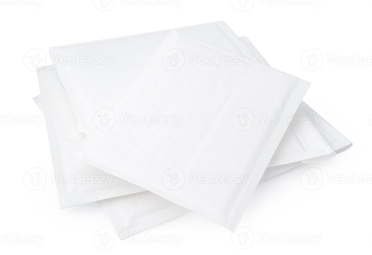 Stack of envelopes on white background photo