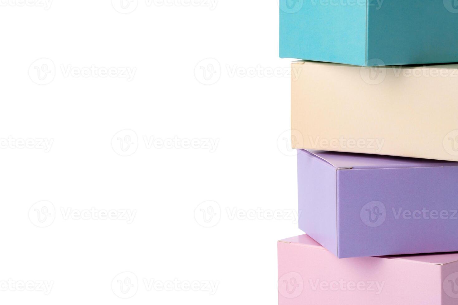Colorful paper gift boxes isolated on white photo