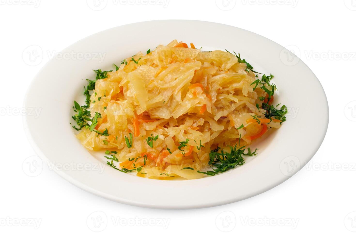 Stewed white cabbage on white plate isolated photo