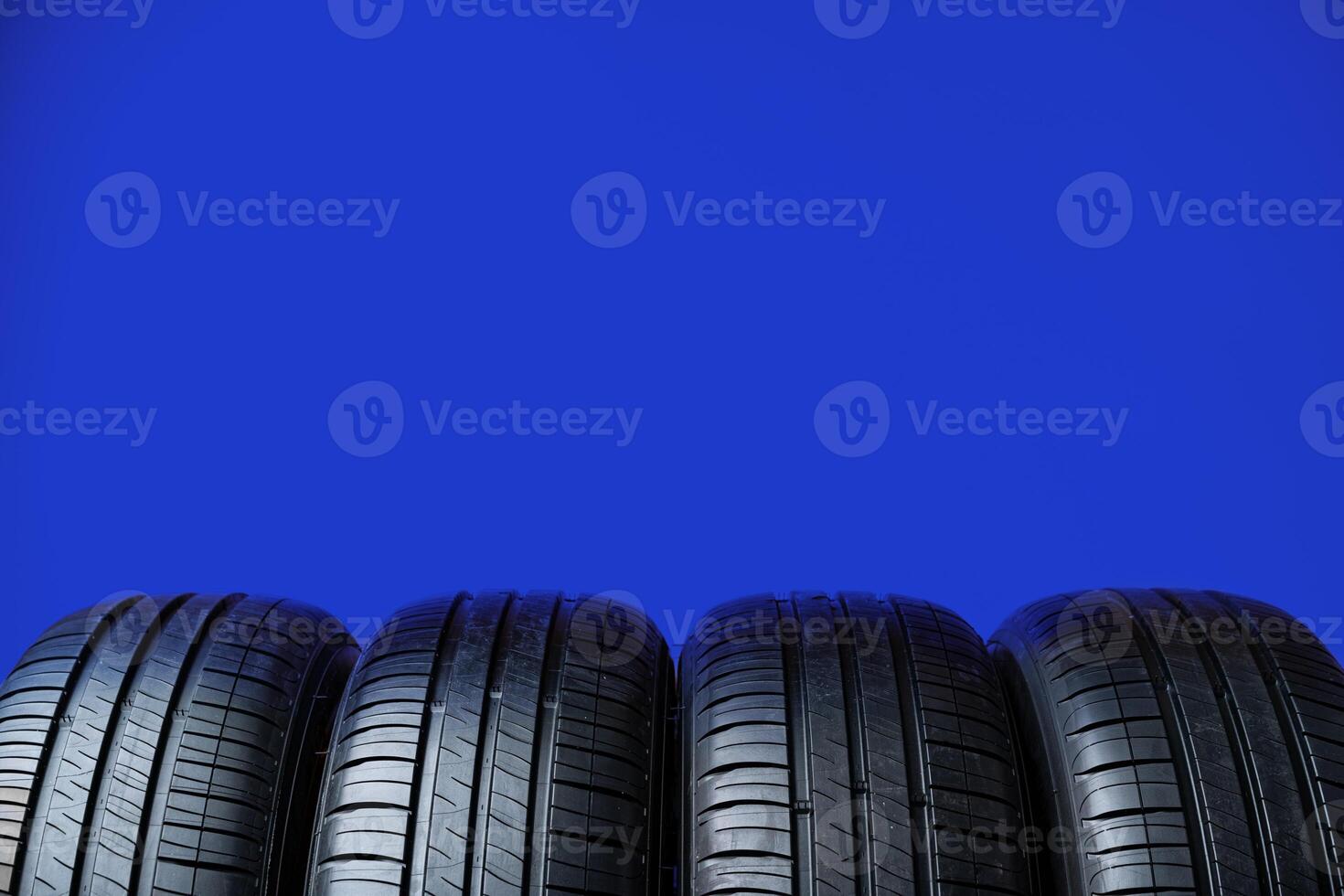 Group of tires on a blue background photo