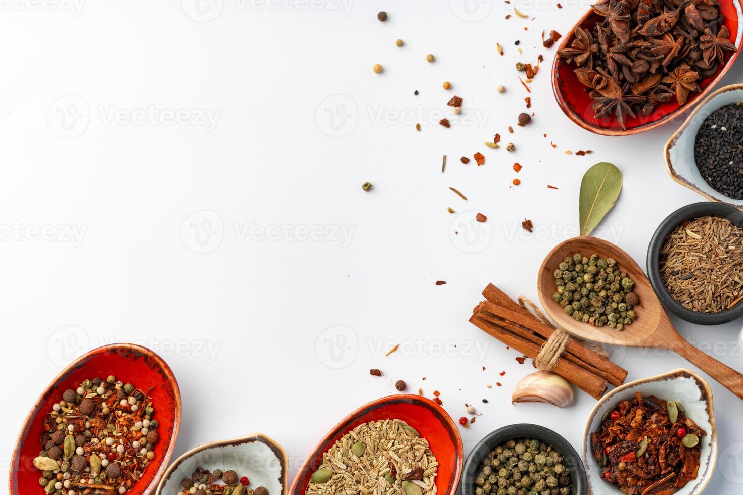 Bowls with various spices on white background photo