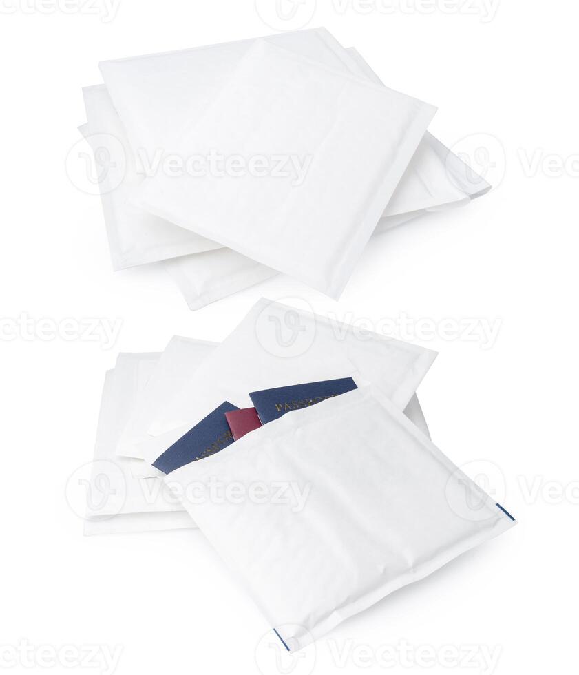 Stack of envelopes on white background photo