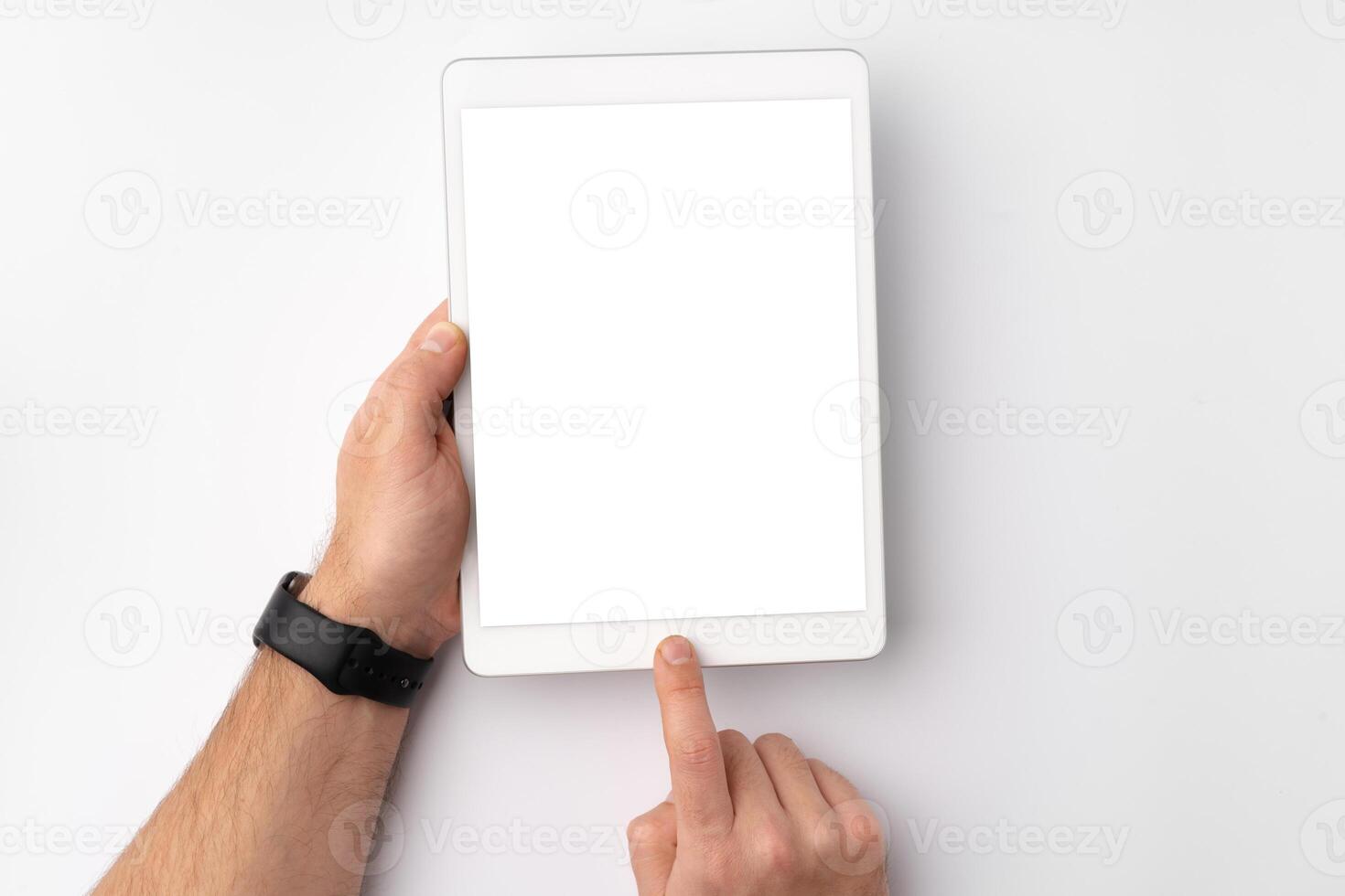 Digital tablet computer close up, man using tablet with hands photo