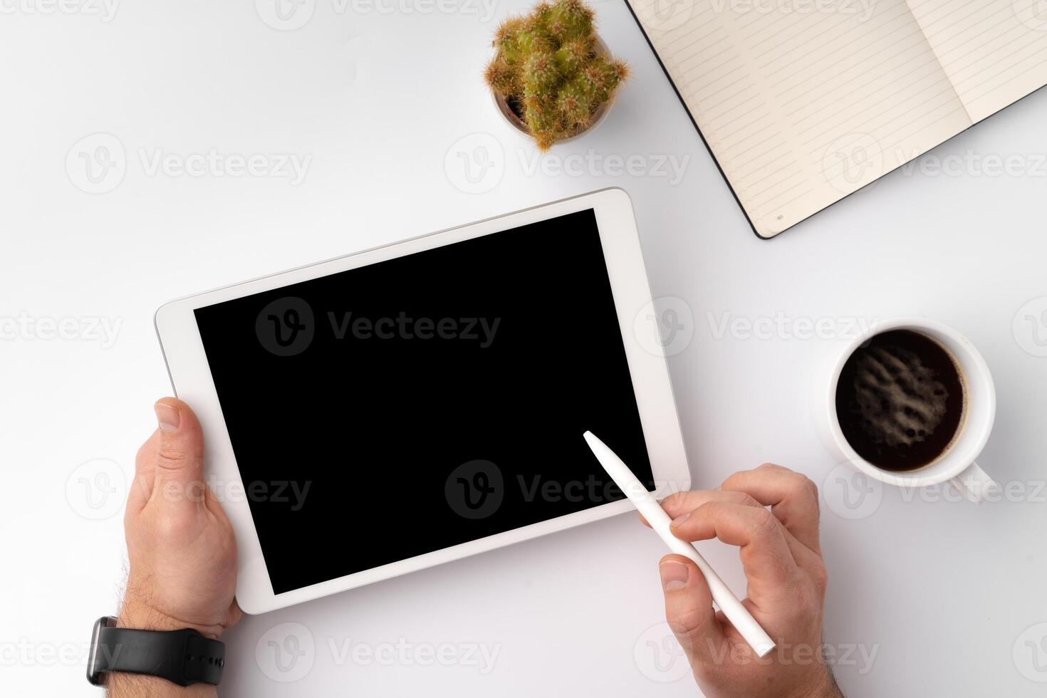 Digital tablet computer close up, man using tablet with hands photo