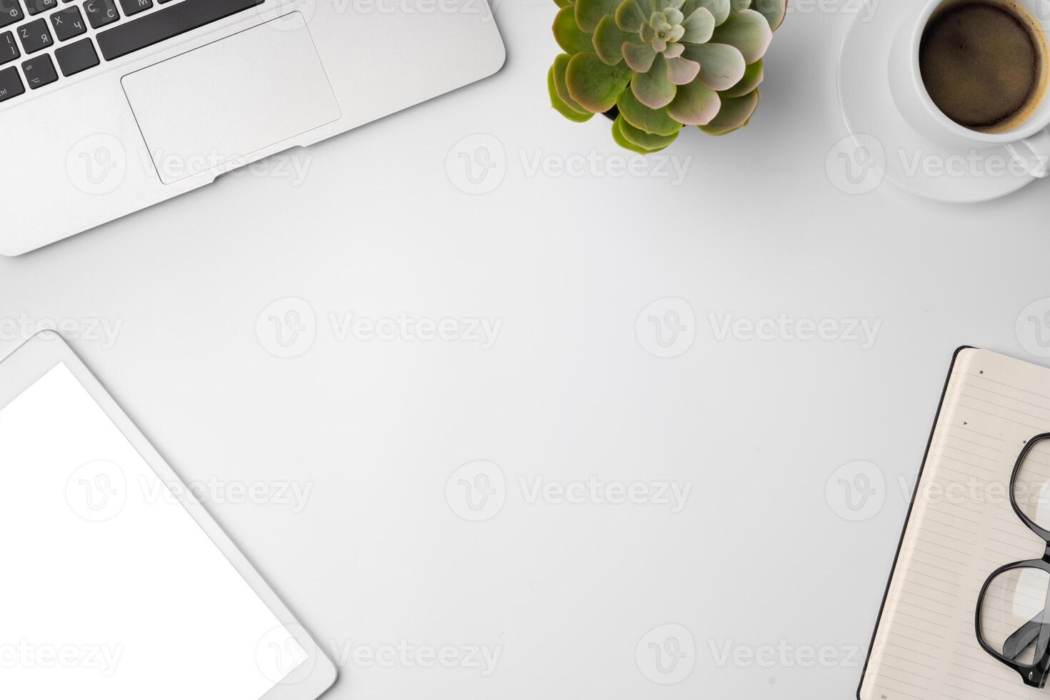 Minimalistic white workplace with keyboard and notebook photo