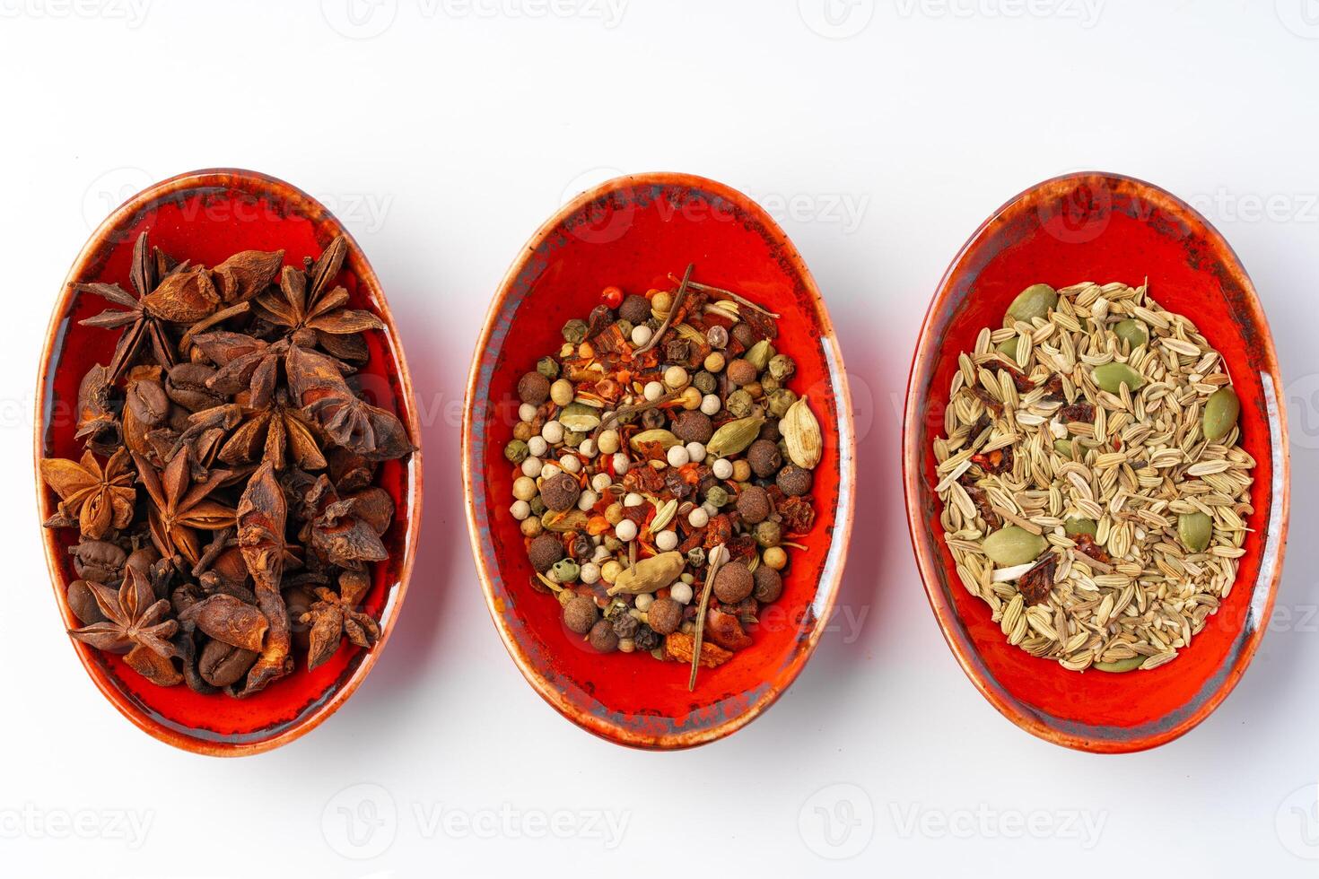 Bowls with various spices on white background photo