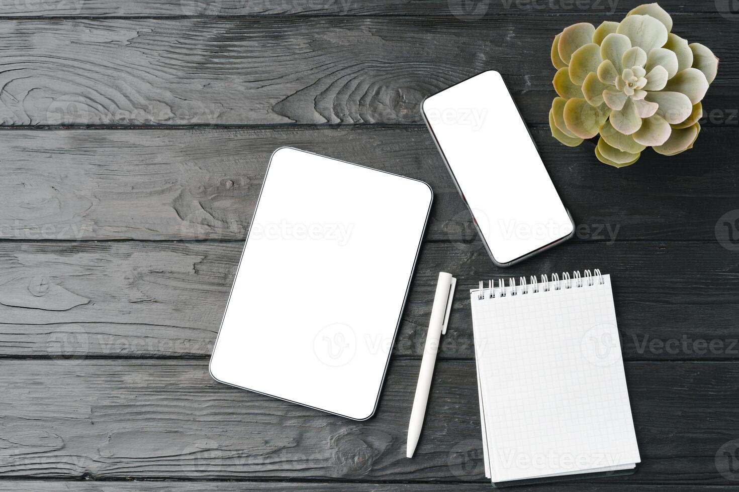 Office supplies and digital tablet on office table photo