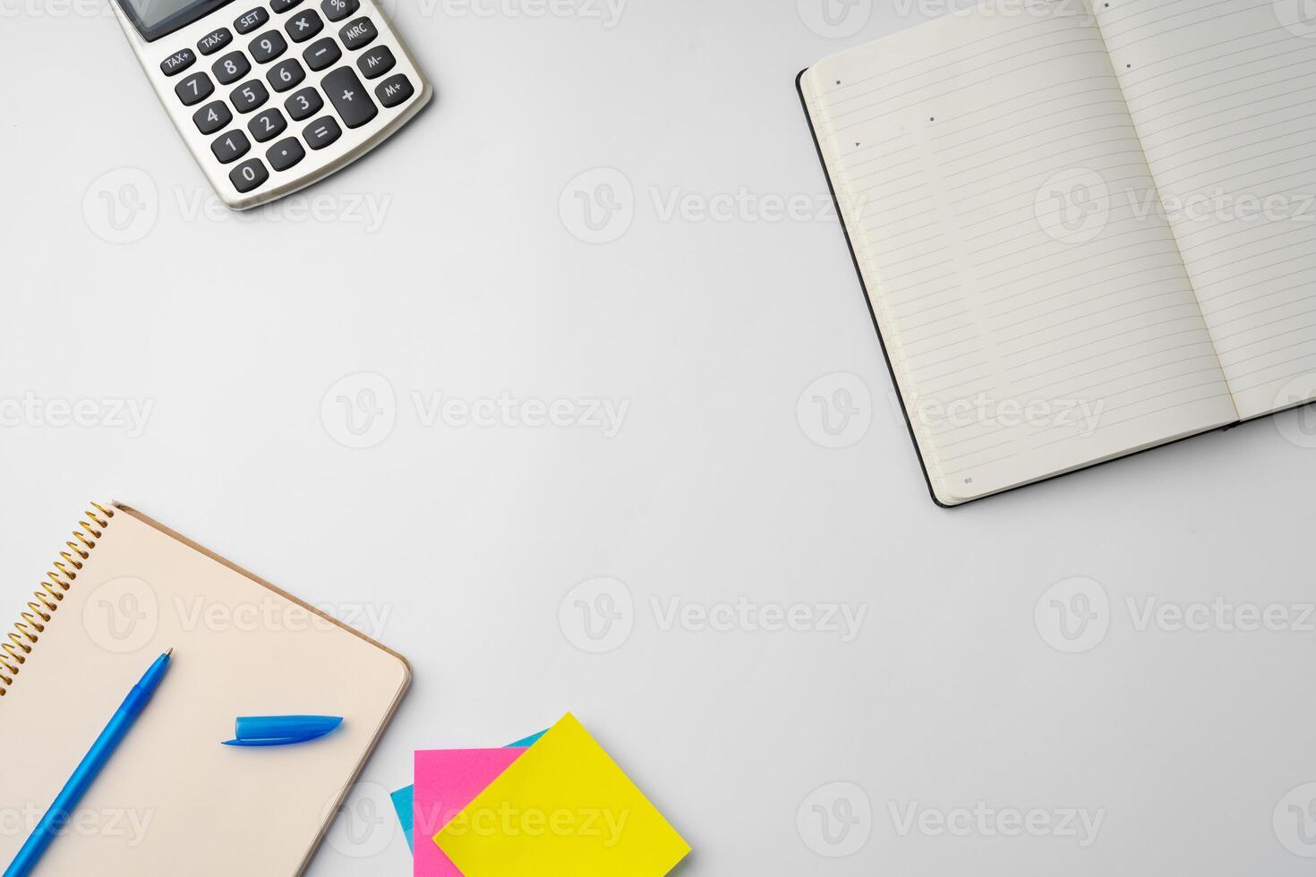 Blank open notepad and pen on white table, close up photo