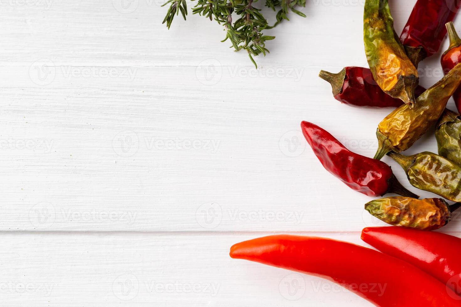 Flat lay composition with chili peppers and spices photo