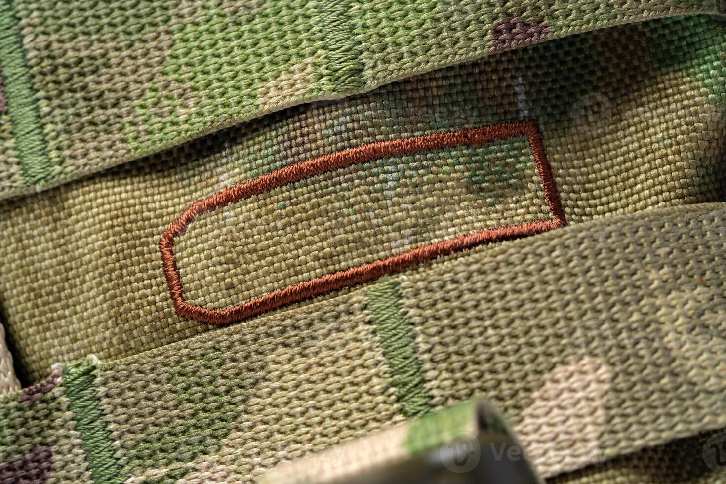 Close up still life of a green army tactical backpack photo