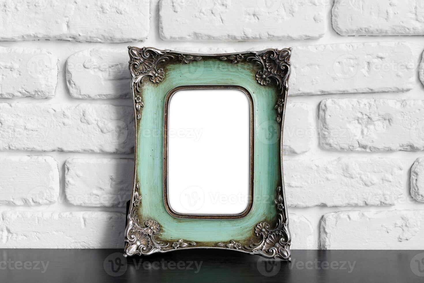 Photo frame with copy space against white brick wall