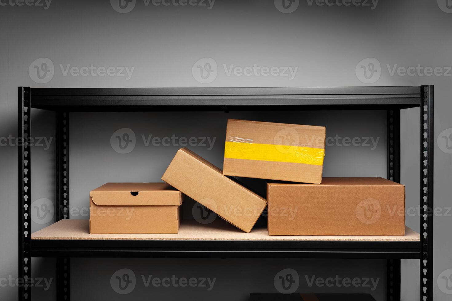 Rack shelves with paper boxes in warehouse. photo