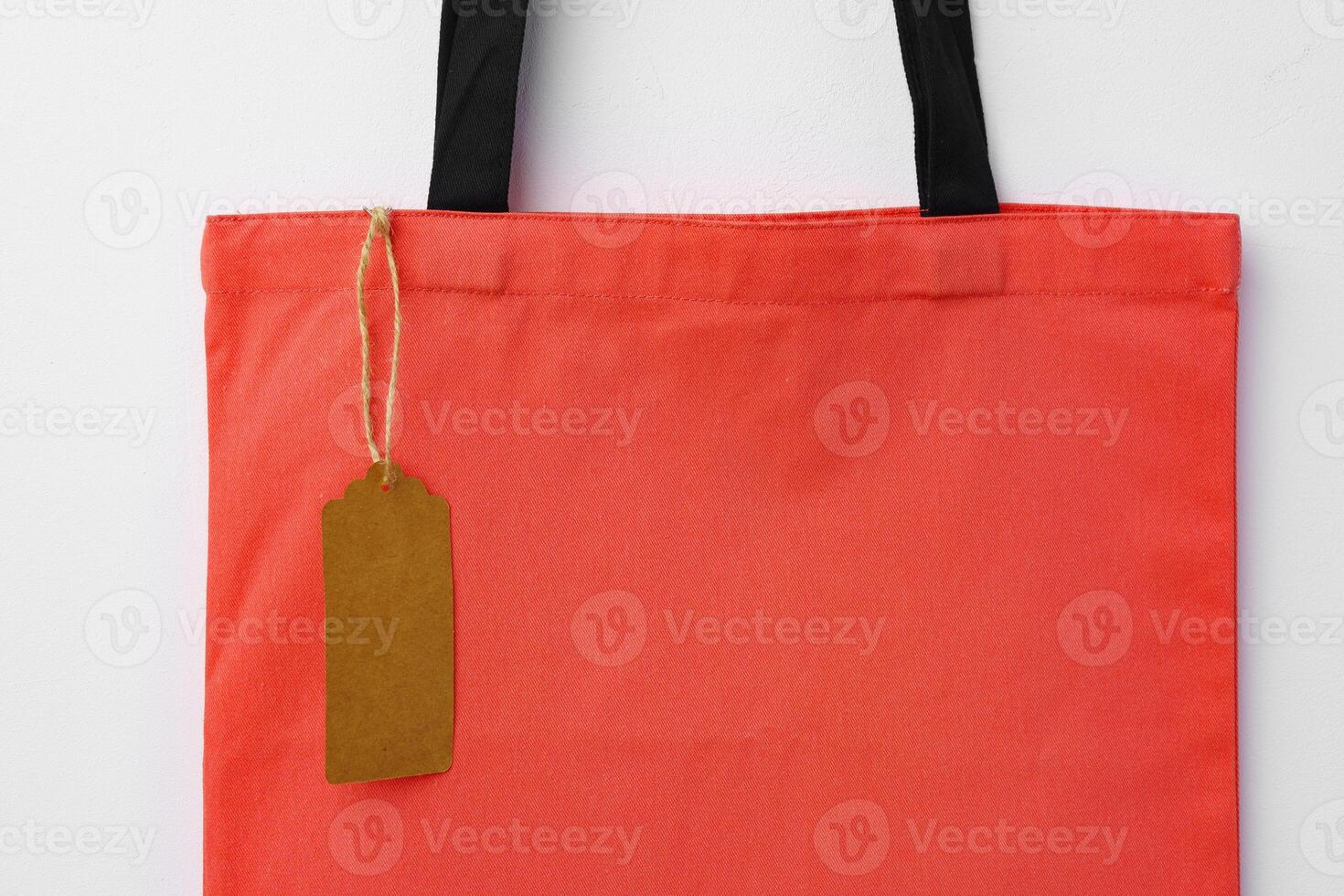 Eco bag for shopping with blank tag on white background photo