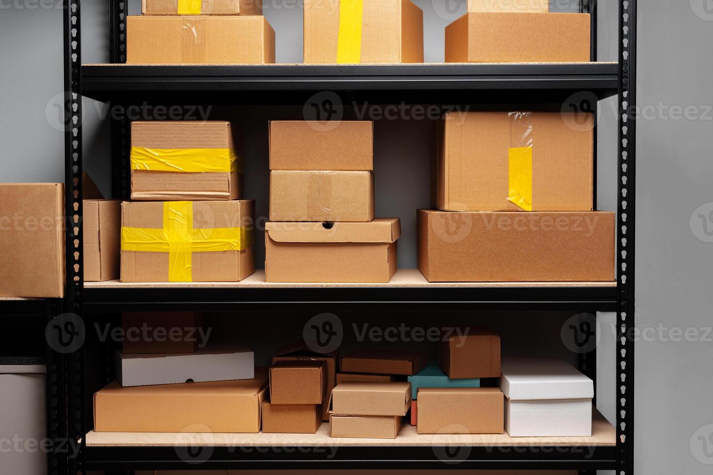 Rack shelves with paper boxes in warehouse. photo
