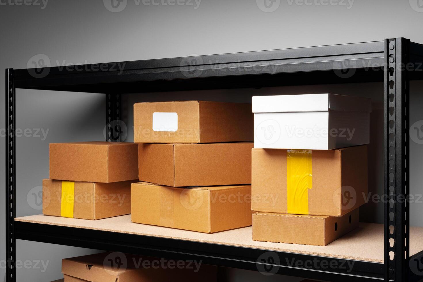 Rows of shelves with cardboard boxes in modern warehouse photo